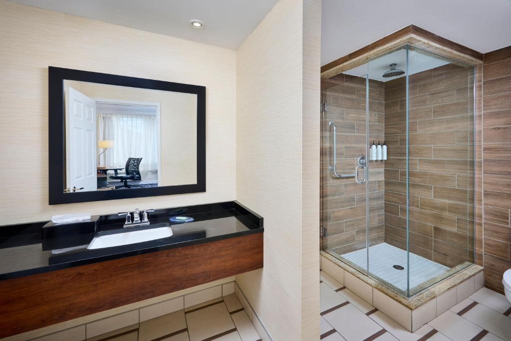 a bathroom with a sink and a shower at Fairfield Inn & Suites by Marriott Ottawa Kanata in Ottawa