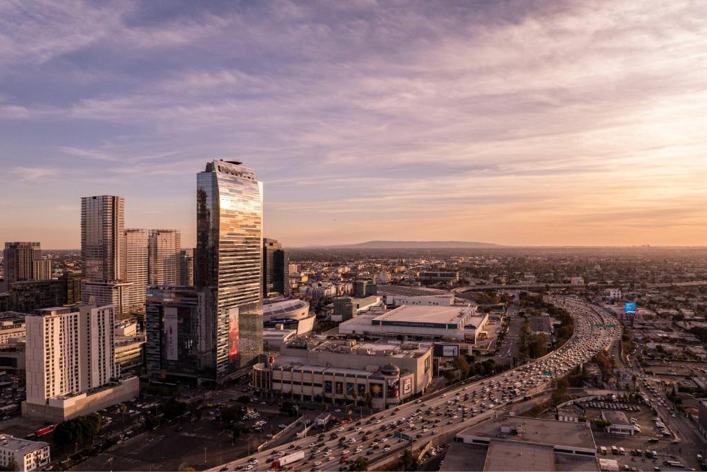an aerial view of a city with a tall building at The Ritz-Carlton, Los Angeles L.A. Live in Los Angeles