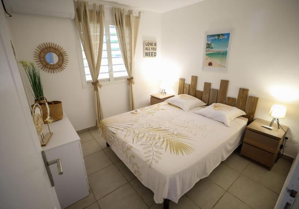 Postel nebo postele na pokoji v ubytování Belle vue de Grande Anse
