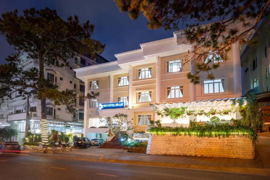 a building on a street at night at BIDV Central Da Lat Hotel in Da Lat