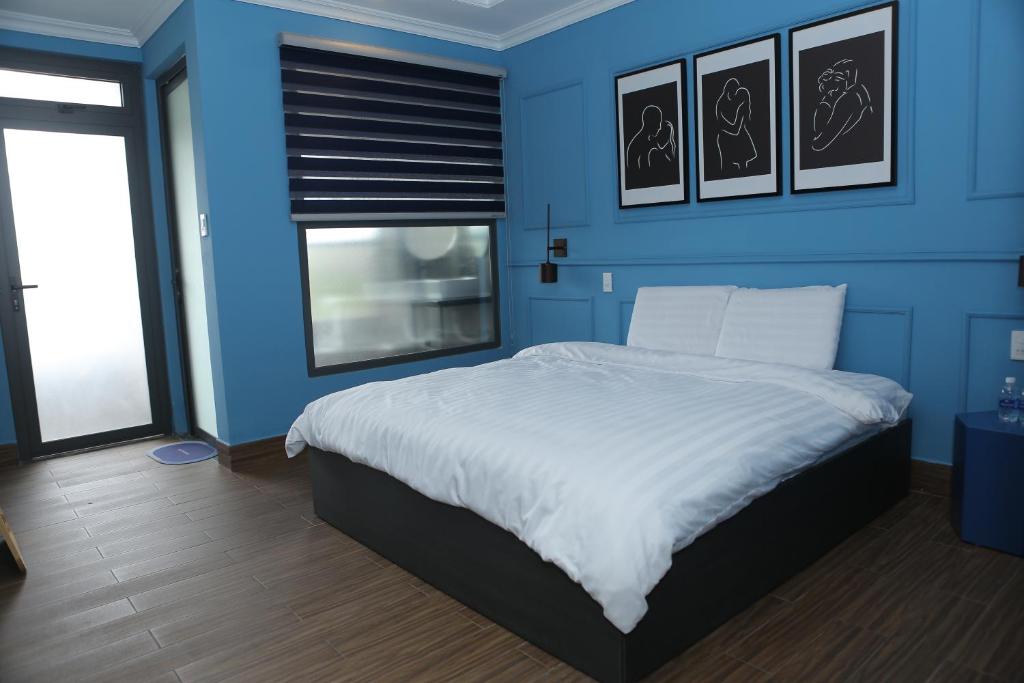 Giường trong phòng chung tại AN PHÚ Home