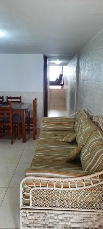 a room with two large beds in a room at Iguabinha Duplex Pé na Areia in Iguaba Grande