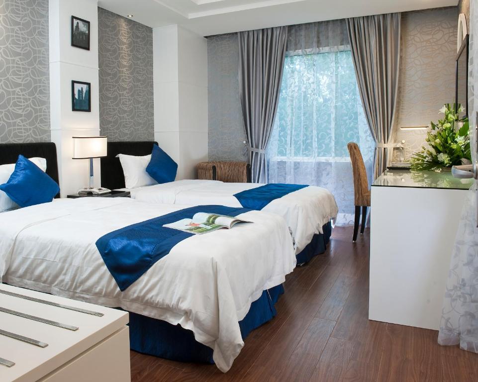 Postel nebo postele na pokoji v ubytování Victor Gallery hotel & spa - Victor Group