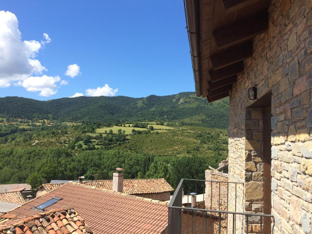 a view of the mountains from a house at Apartamento Borda de Farras in Bonansa