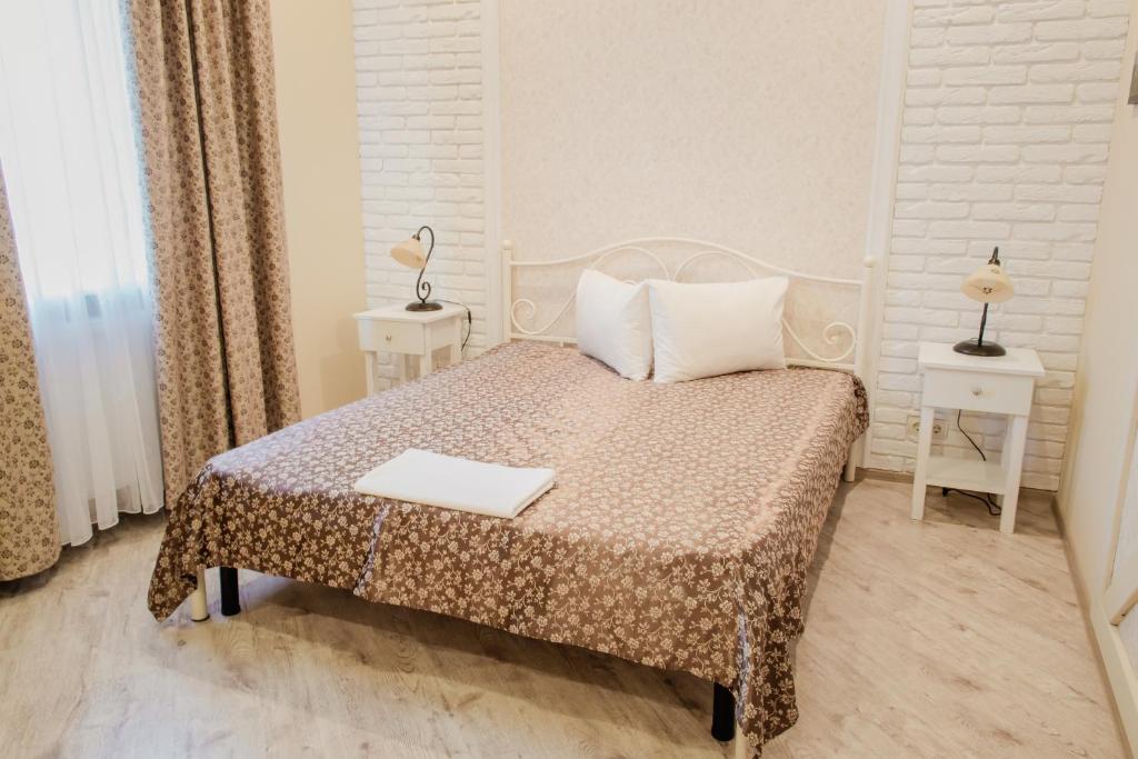 Postel nebo postele na pokoji v ubytování Green Hall Hotel