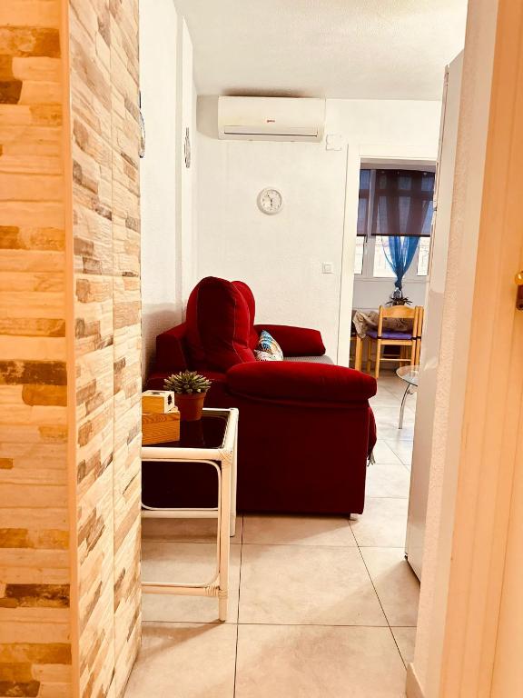 A seating area at Apartment Santana -19 at Beach with Pool, Garage and Lift