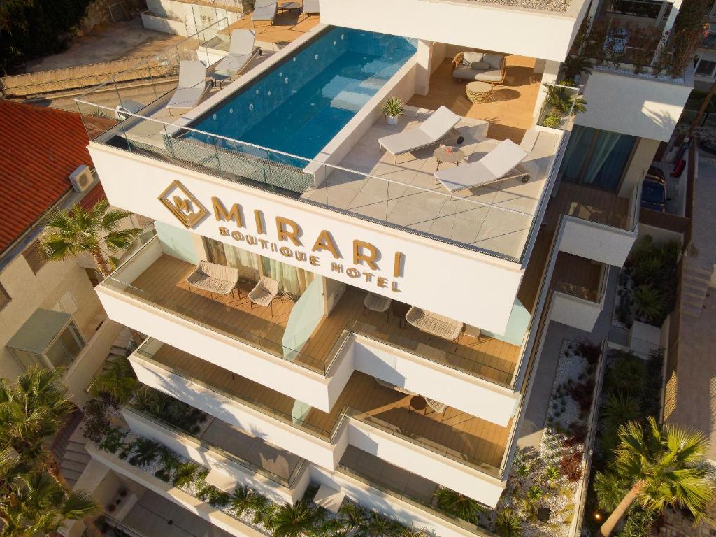 an aerial view of a building with a swimming pool at Mirari Boutique Hotel in Split