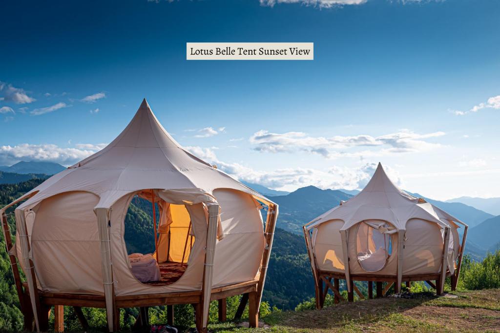 two tents sitting on top of a mountain at Glamping Tago in Khulo
