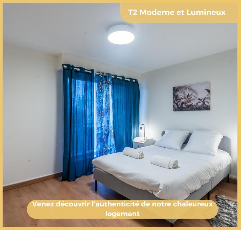 Una cama o camas en una habitaci&oacute;n de Appartement T2 Moderne Gaillard