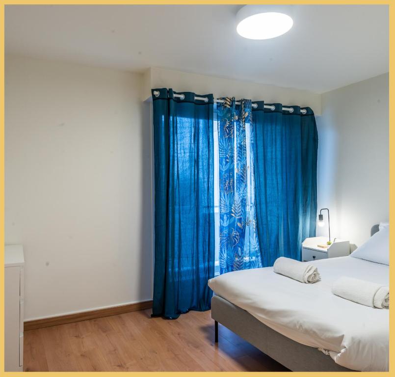 Una cama o camas en una habitaci&oacute;n de Appartement T2 Moderne Gaillard