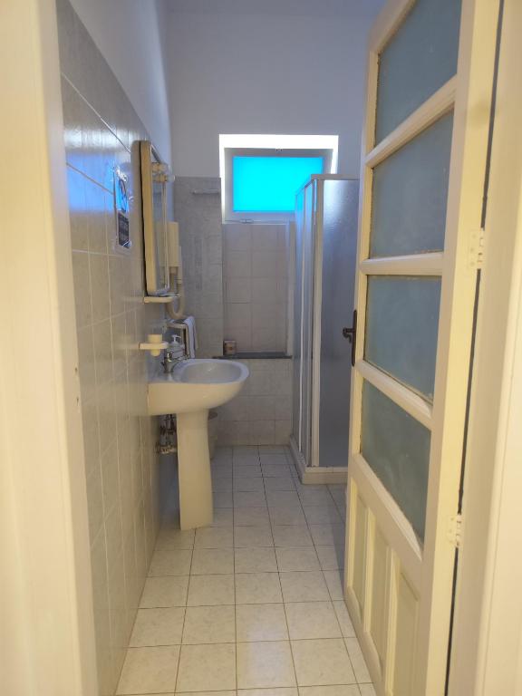 Koupelna v ubytování Hotel Faraglione
