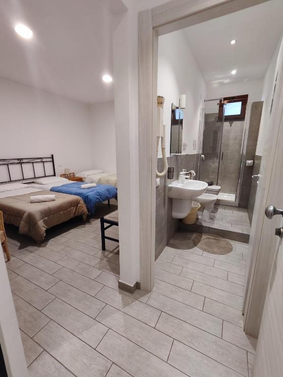 Koupelna v ubytování Hotel Faraglione