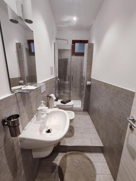 Koupelna v ubytování Hotel Faraglione
