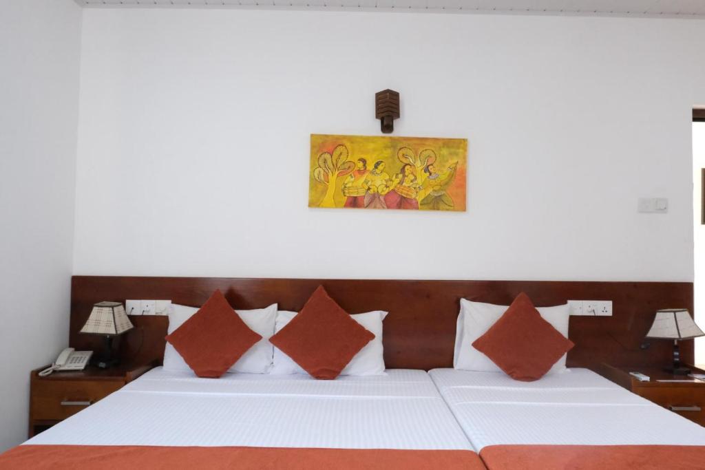 Postel nebo postele na pokoji v ubytování My City Hotel