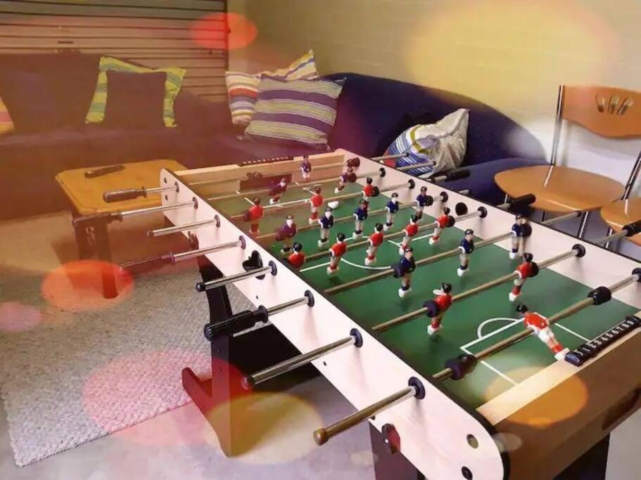 a large billiard table with aedes at Bec's Beach House Getaway in Batemans Bay