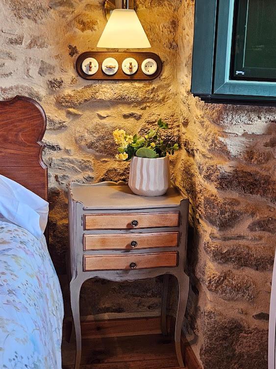 Postel nebo postele na pokoji v ubytování A Casa dos Avós - Vilariño - A Coruña