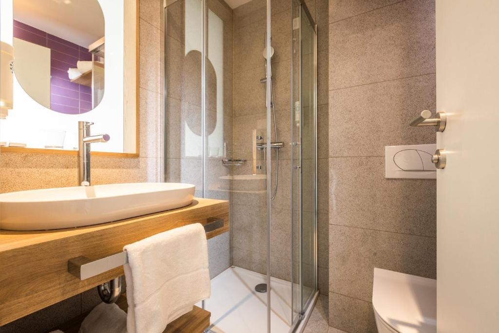 Koupelna v ubytování Hotel Vile Park Premium