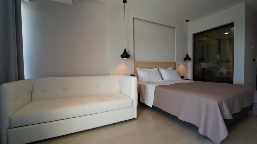 Voodi või voodid majutusasutuse Enjoy Lichnos Bay Village, Camping, Hotel and Apartments toas