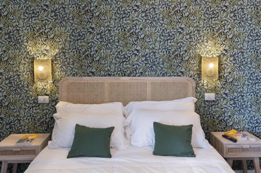 Posteľ alebo postele v izbe v ubytovaní Hotel Villa Lubrense Sorrento