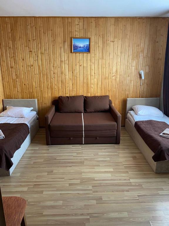 Postel nebo postele na pokoji v ubytování Шепіт Карпат