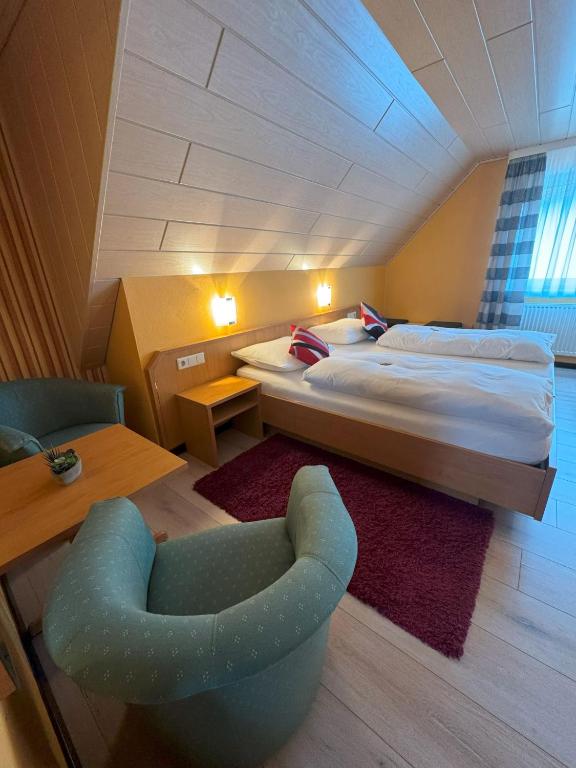 Postel nebo postele na pokoji v ubytování Hotel Harbauer