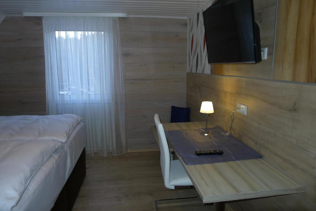 Postel nebo postele na pokoji v ubytování Hotel Harbauer