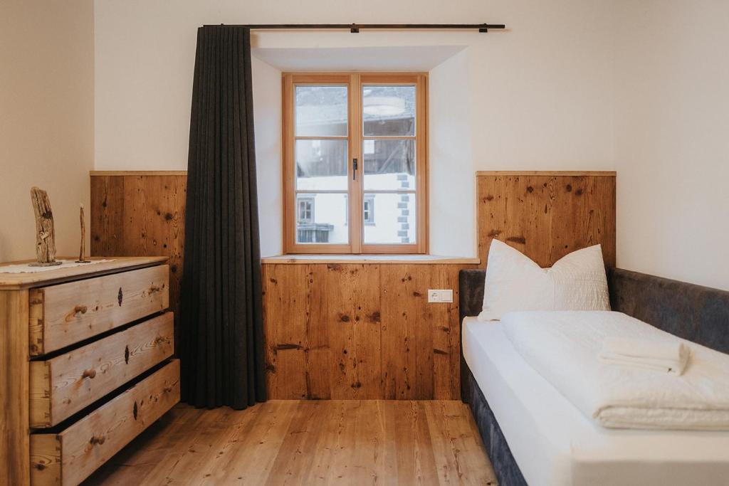 Postel nebo postele na pokoji v ubytování Alpin Chalet Samer