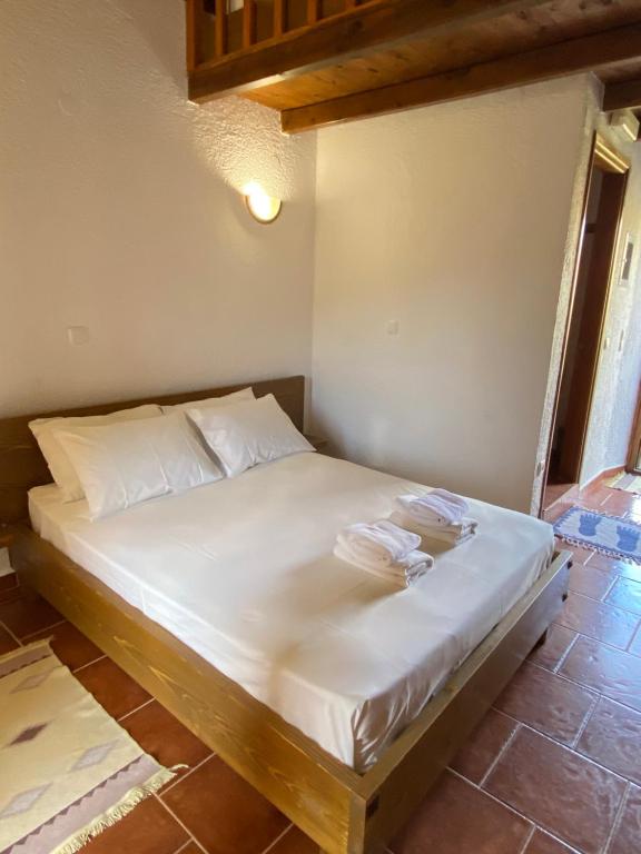 Postel nebo postele na pokoji v ubytování To Palio