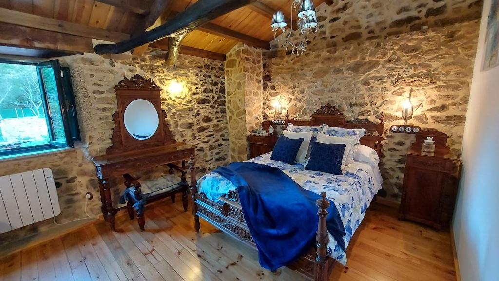 Postel nebo postele na pokoji v ubytování A Casa dos Avós - Vilariño - A Coruña
