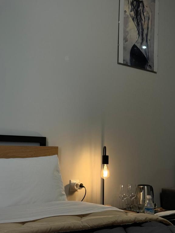 Postel nebo postele na pokoji v ubytování Hostal Lavela