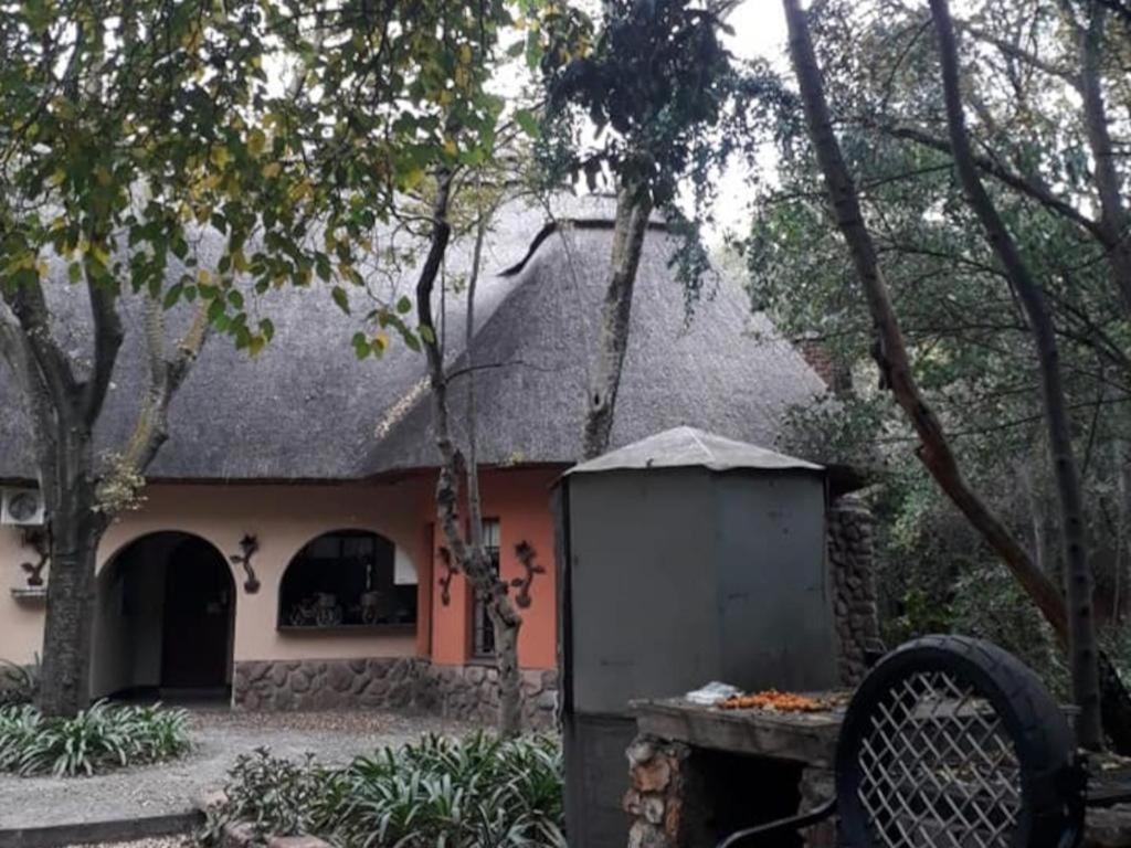 a small house with a shed in front of it at Lapalosa Lodge in Centurion