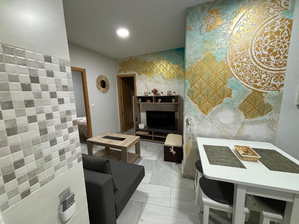 A seating area at Apartamento céntrico en Plaza San Miguel