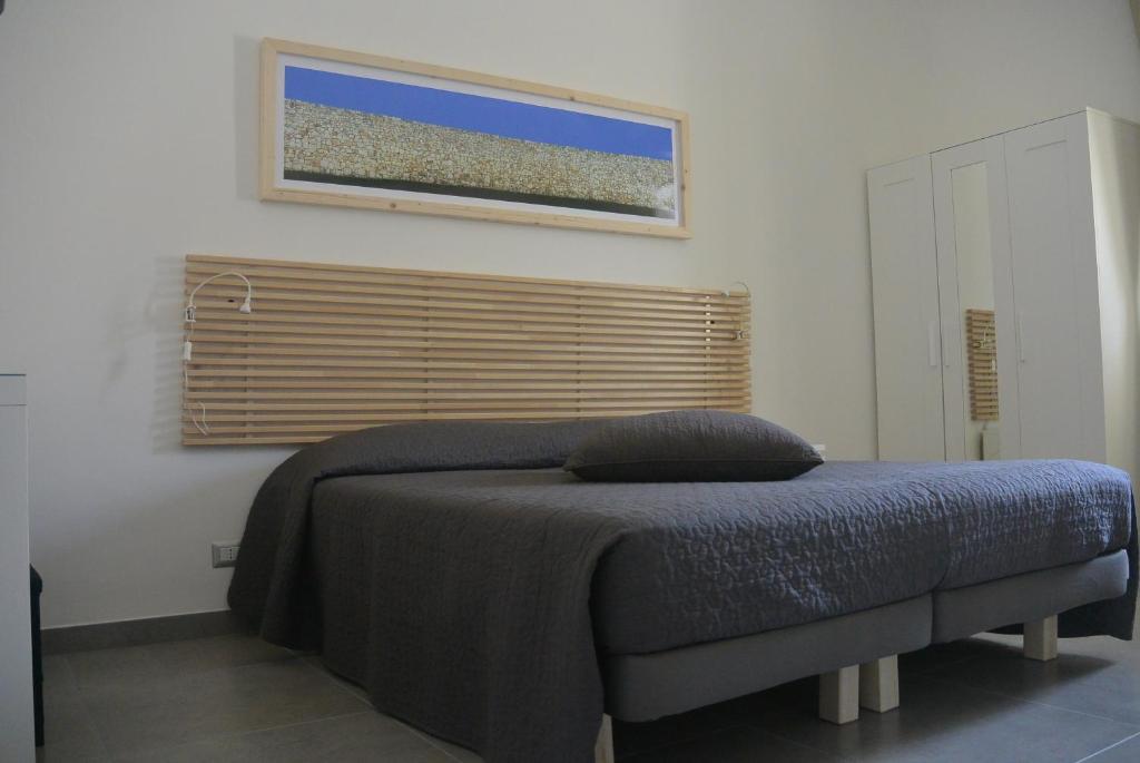 Postel nebo postele na pokoji v ubytování Le Signorine
