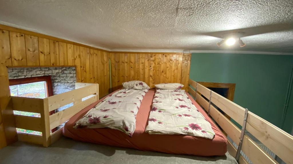 Postel nebo postele na pokoji v ubytování Dobó Tanya