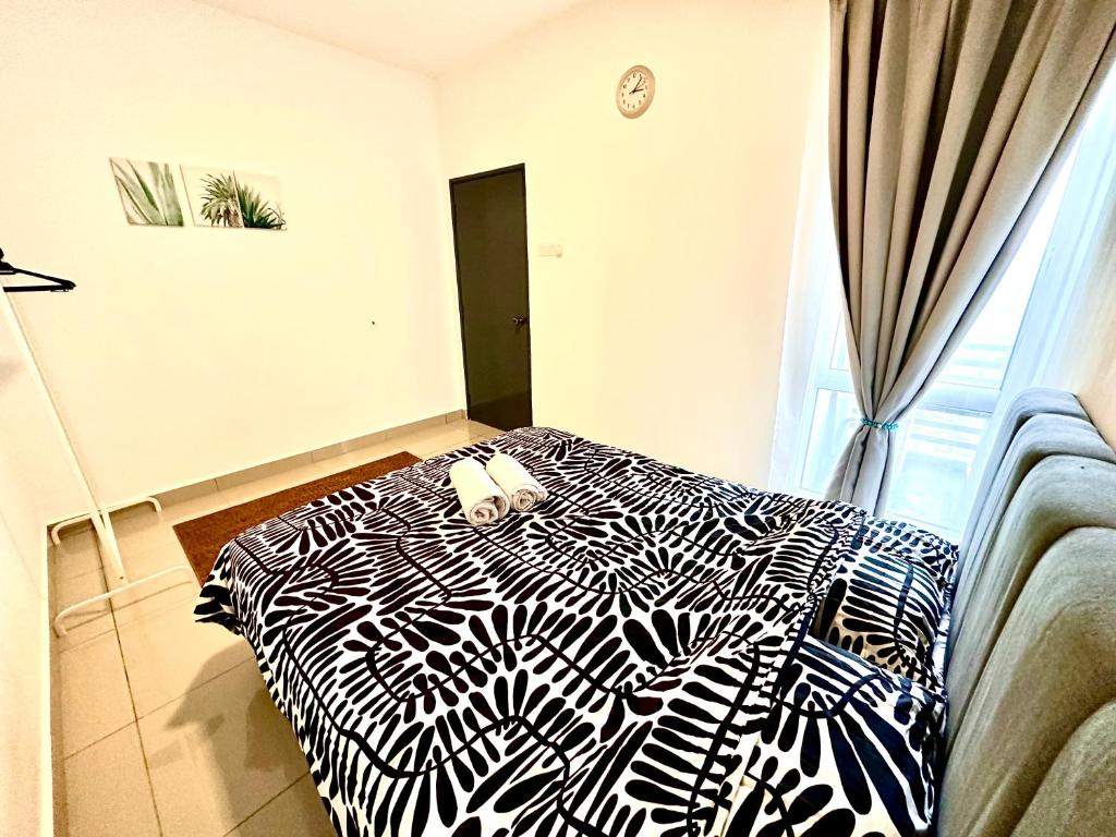 Postel nebo postele na pokoji v ubytování Casa Budi Dwiputra 15 Putrajaya