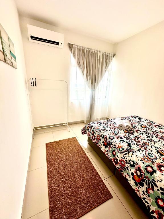 Postel nebo postele na pokoji v ubytování Casa Budi Dwiputra 15 Putrajaya