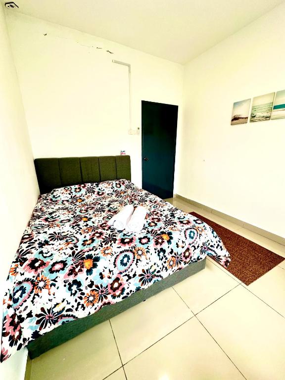 Postel nebo postele na pokoji v ubytování Casa Budi Dwiputra 15 Putrajaya