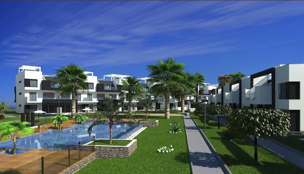 Bazén v ubytování Oasis Beach El Raso Guardamar nebo v jeho okolí