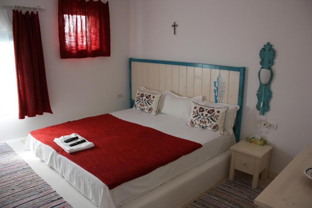 Un pat sau paturi într-o cameră la DELTARIUM AEGIS