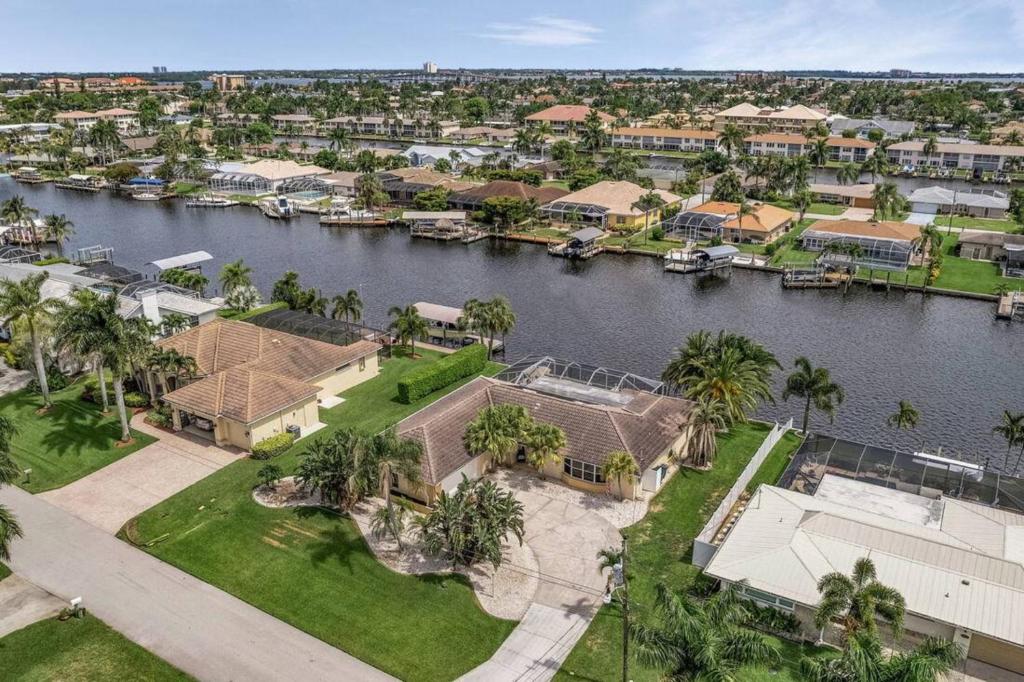 an aerial view of a house with a marina at Villa Catalina Isles - Holidays in Paradise in Cape Coral