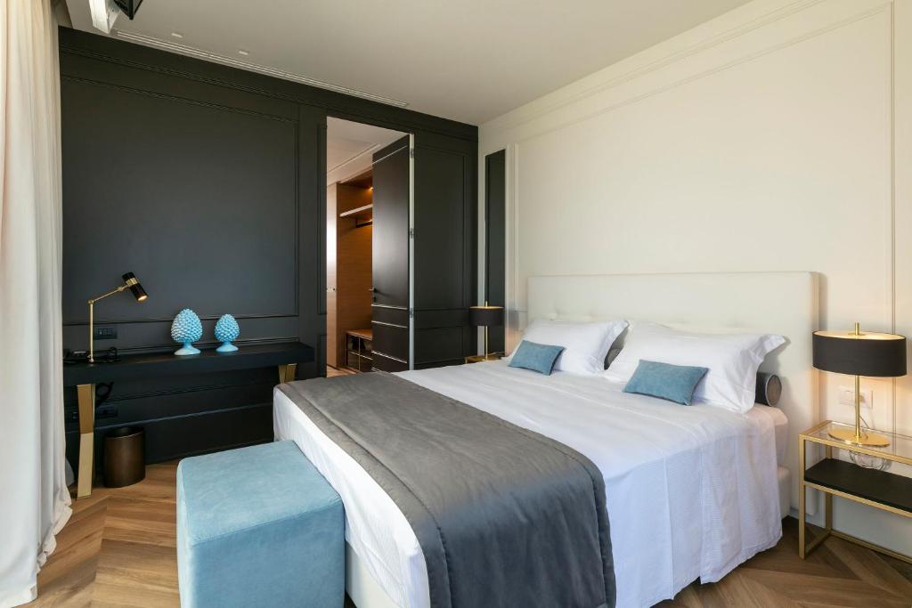 Postel nebo postele na pokoji v ubytování Hotel Abner's