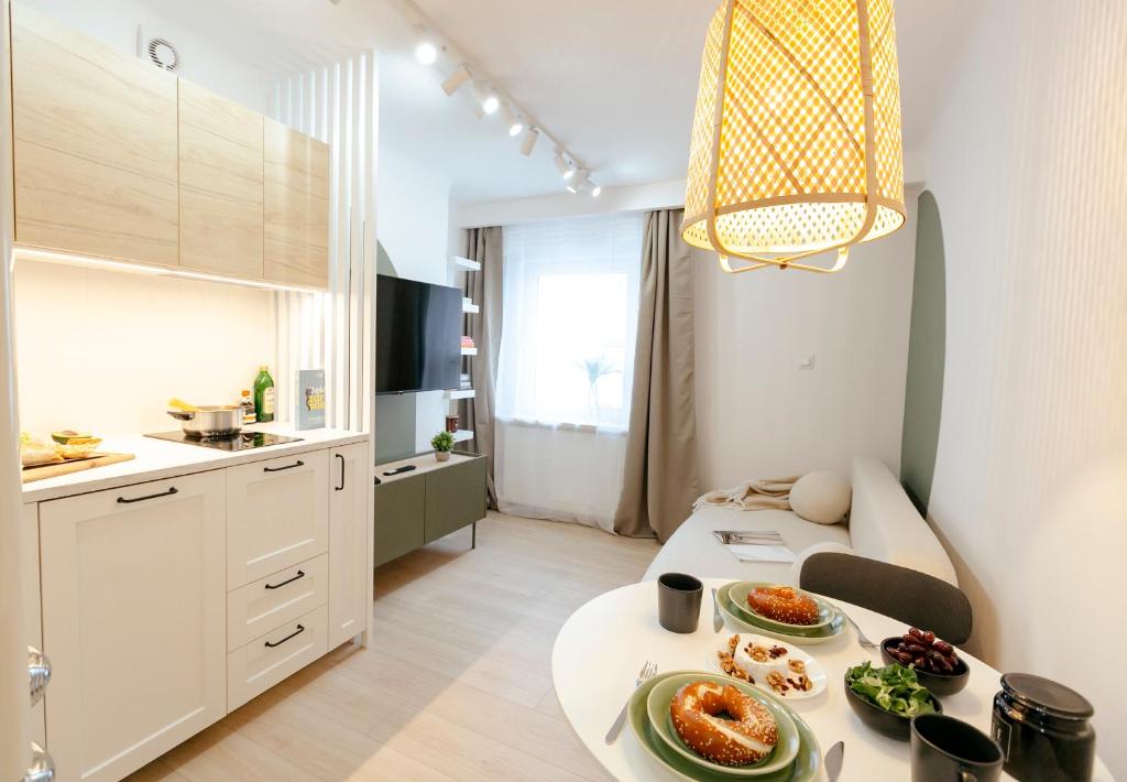 Η κουζίνα ή μικρή κουζίνα στο Puławska 11 -Prywatny apartament 4 osobowy w centrum Warszawy - Better Rental