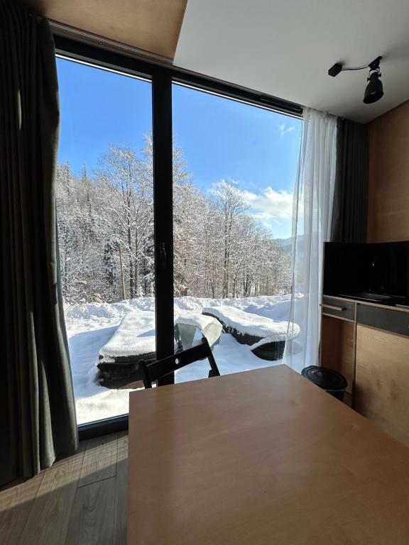 Postel nebo postele na pokoji v ubytování Apartamenty Szuflandia z sauną, jacuzzi, przy stoku narciarskim
