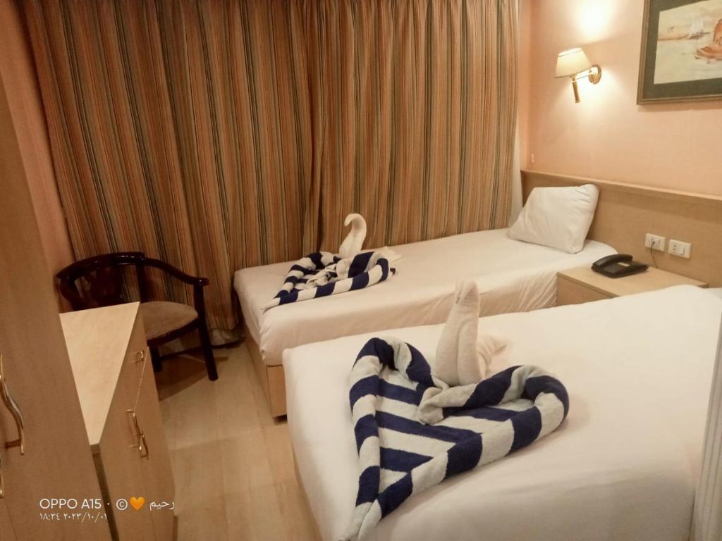 Postel nebo postele na pokoji v ubytování M/S Nephtis Nile Cruise