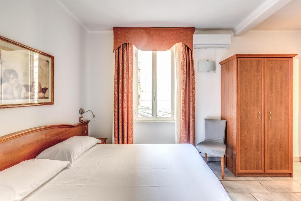 Letto o letti in una camera di Guest House Masterintrastevere
