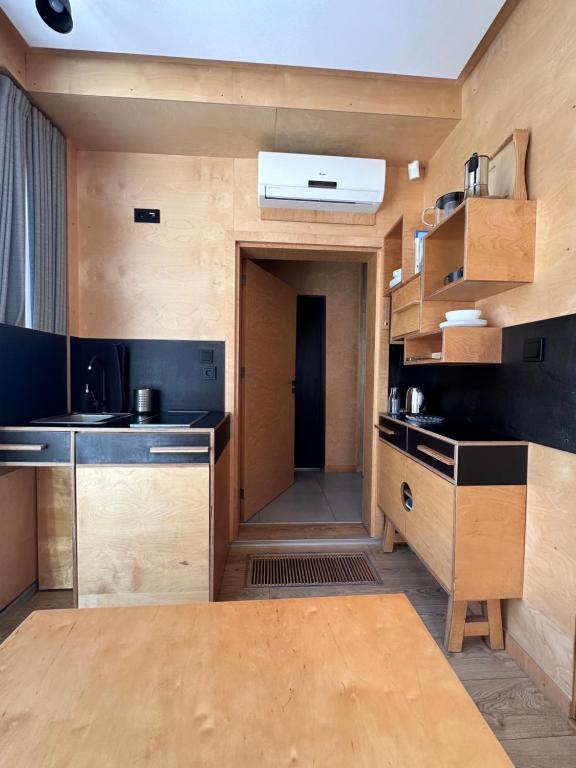 Kuchyň nebo kuchyňský kout v ubytování Apartamenty Szuflandia z sauną, jacuzzi, przy stoku narciarskim