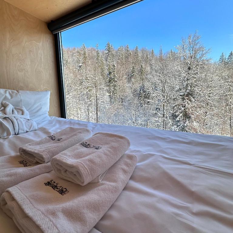 Postel nebo postele na pokoji v ubytování Apartamenty Szuflandia z sauną, jacuzzi, przy stoku narciarskim