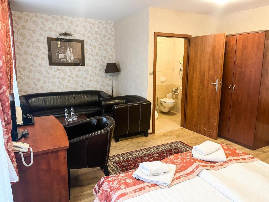 Posteľ alebo postele v izbe v ubytovaní Hotel Logos