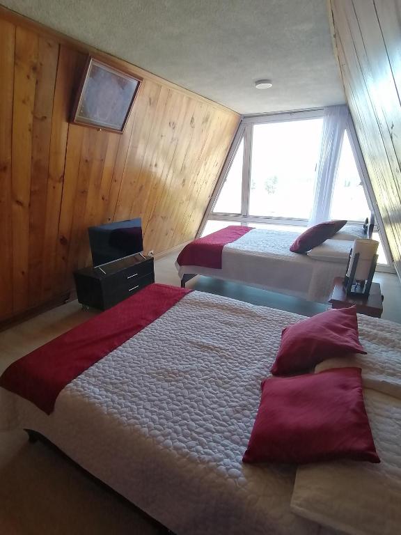 Postel nebo postele na pokoji v ubytování CHALET LOS PINOS