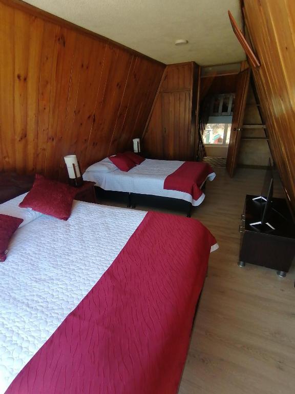 Postel nebo postele na pokoji v ubytování CHALET LOS PINOS